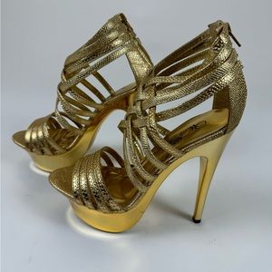 Wild Rose gold platform sandals! Size 6 (I'm a 6.5). Used once for a party.
